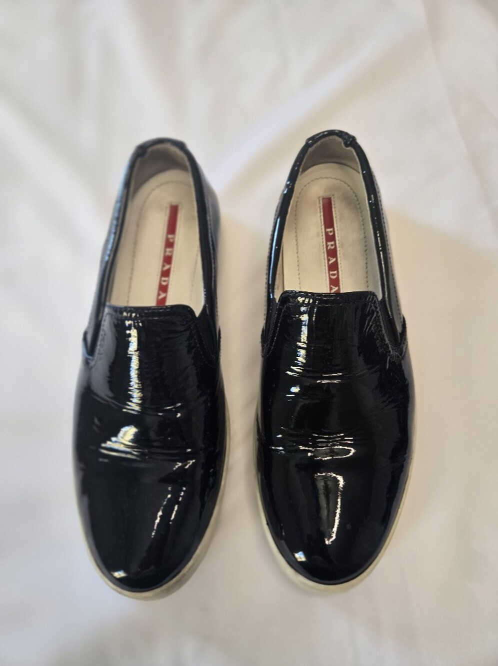Prada Women’s Black Patent Leather Slip-On Loafers